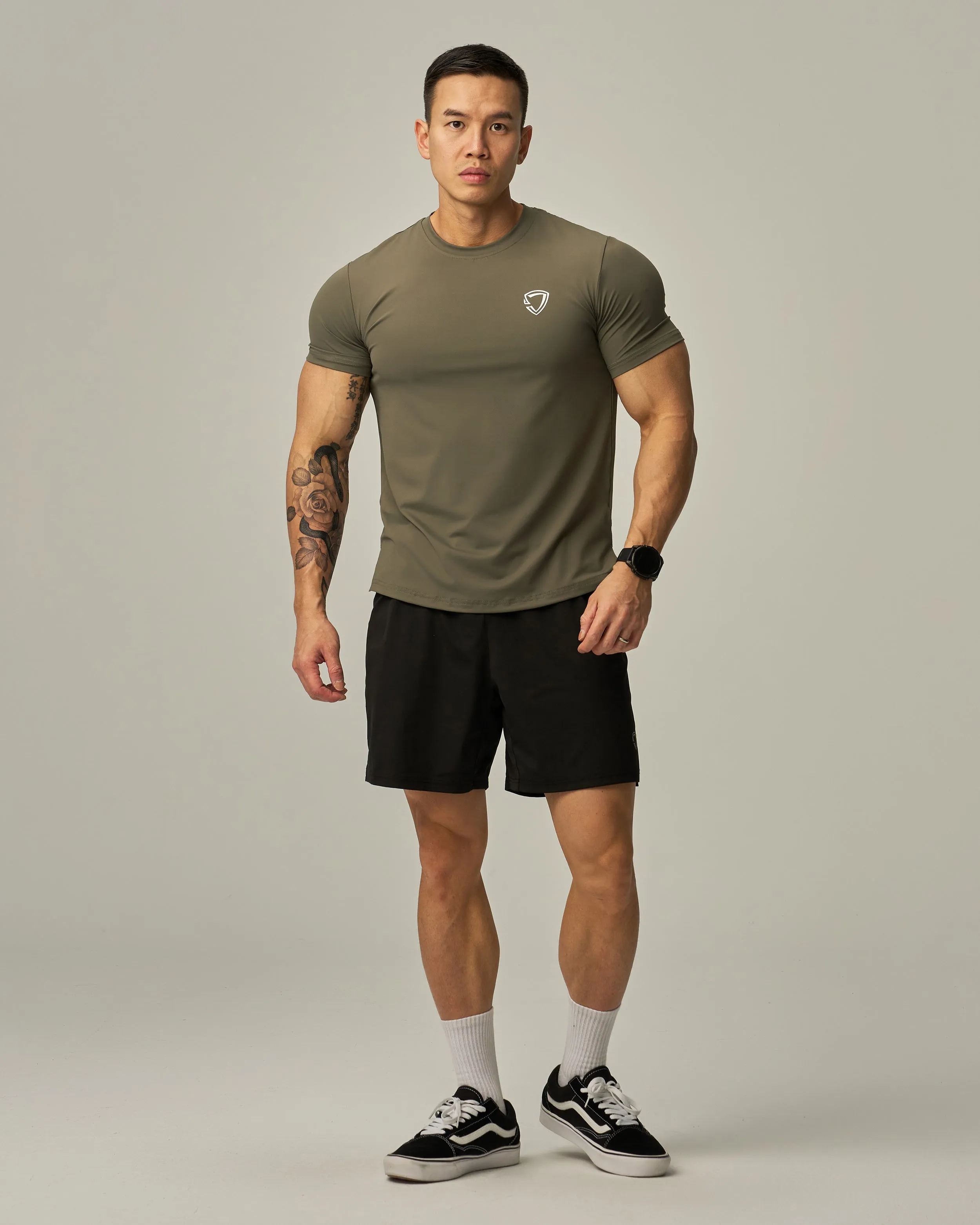 Badge Train Performance Tee