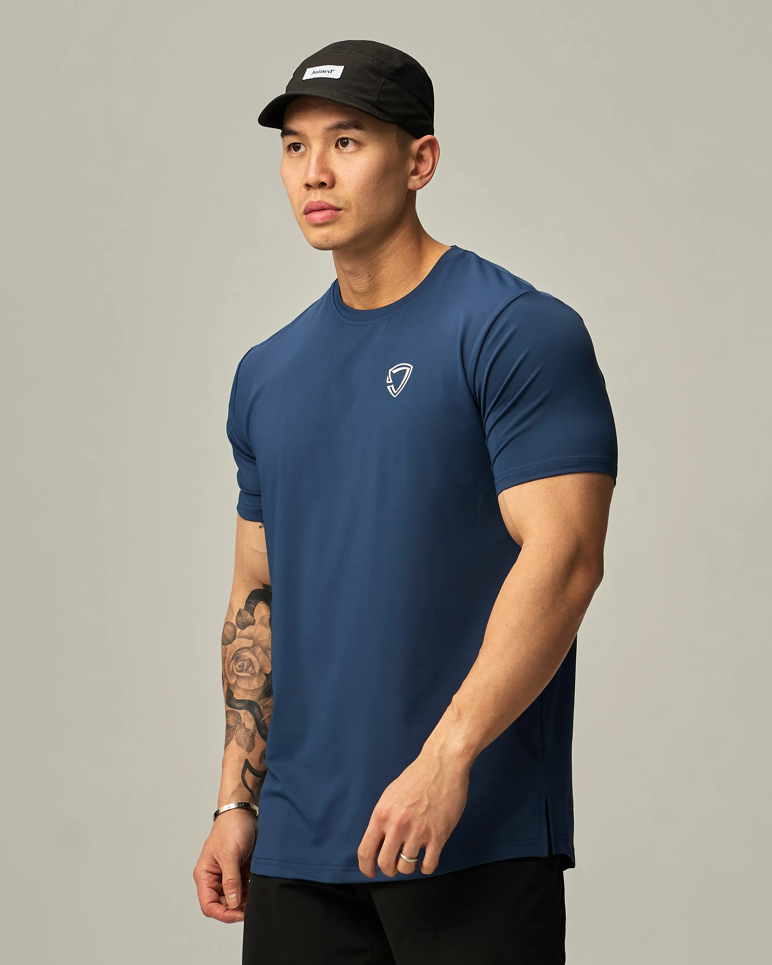 Badge Train Performance Tee