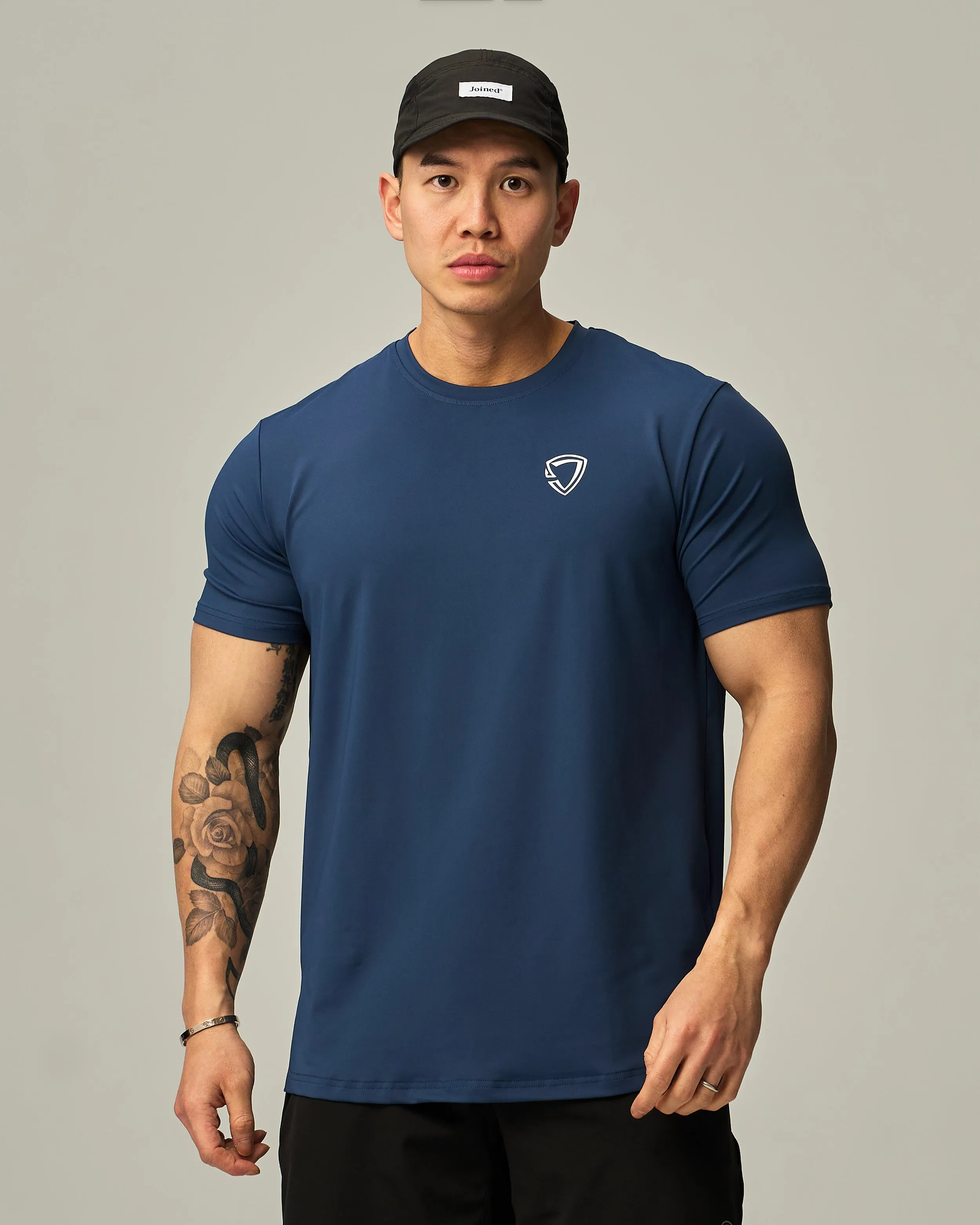 Badge Train Performance Tee