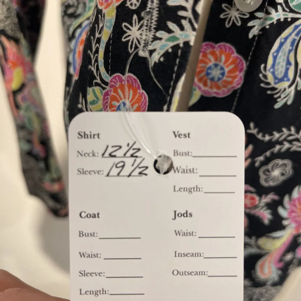 Black shirt w/ a bright floral pattern