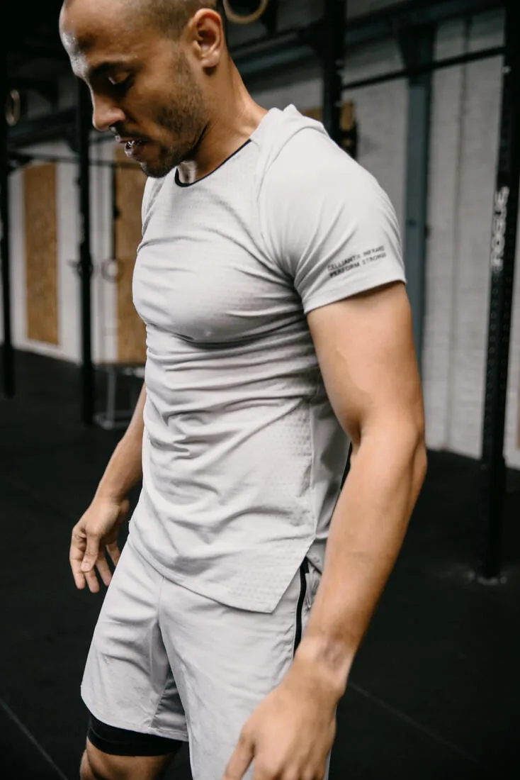 T-SHIRT CROSS TRAINING PERFORMANCE MANCHES COURTES HOMME - CELLIANT GRIS